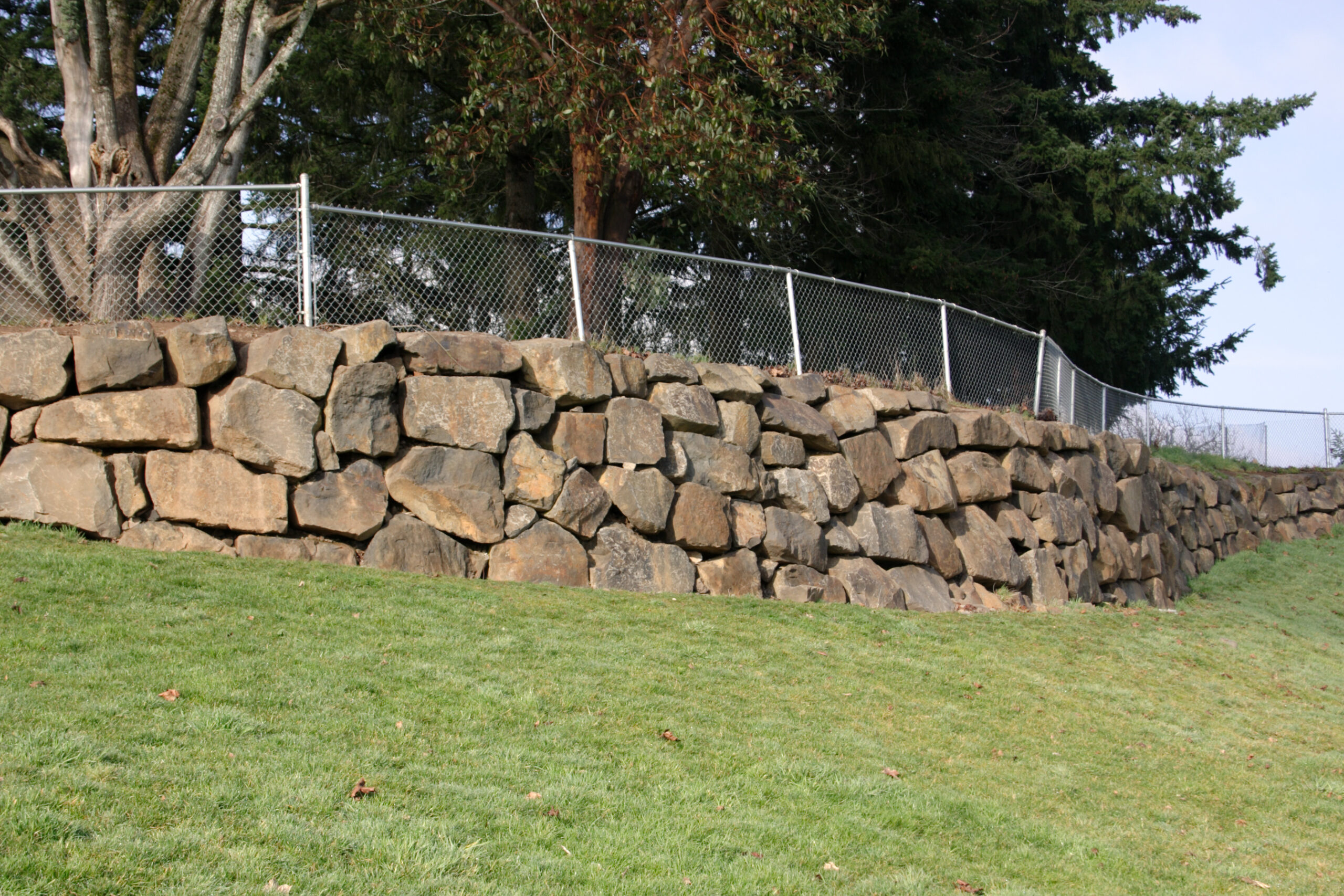 Rock retaining wall.